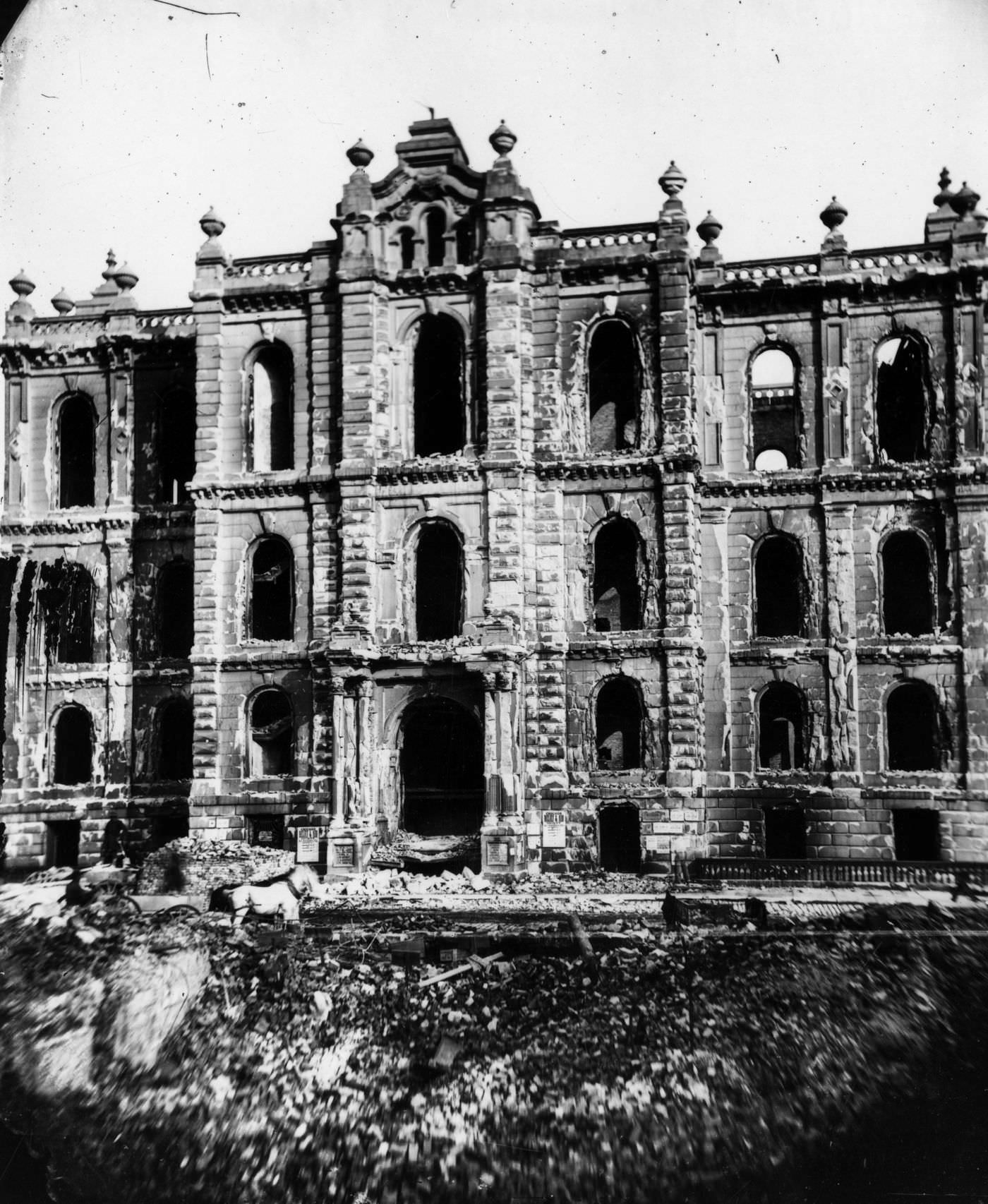 #27 The west entrance to the courthouse shows it in ruins from the Great Chicago Fire in 1871.