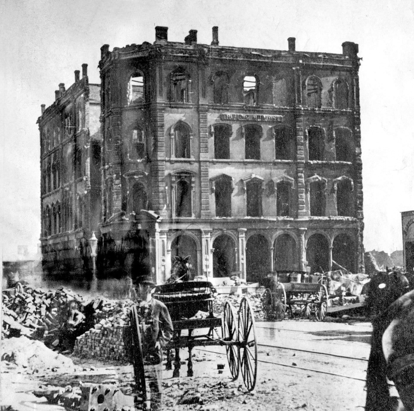 #38 The Chicago Tribune building stands at the southeast corner of Dearborn and Madison streets after the Great Chicago Fire of 1871.