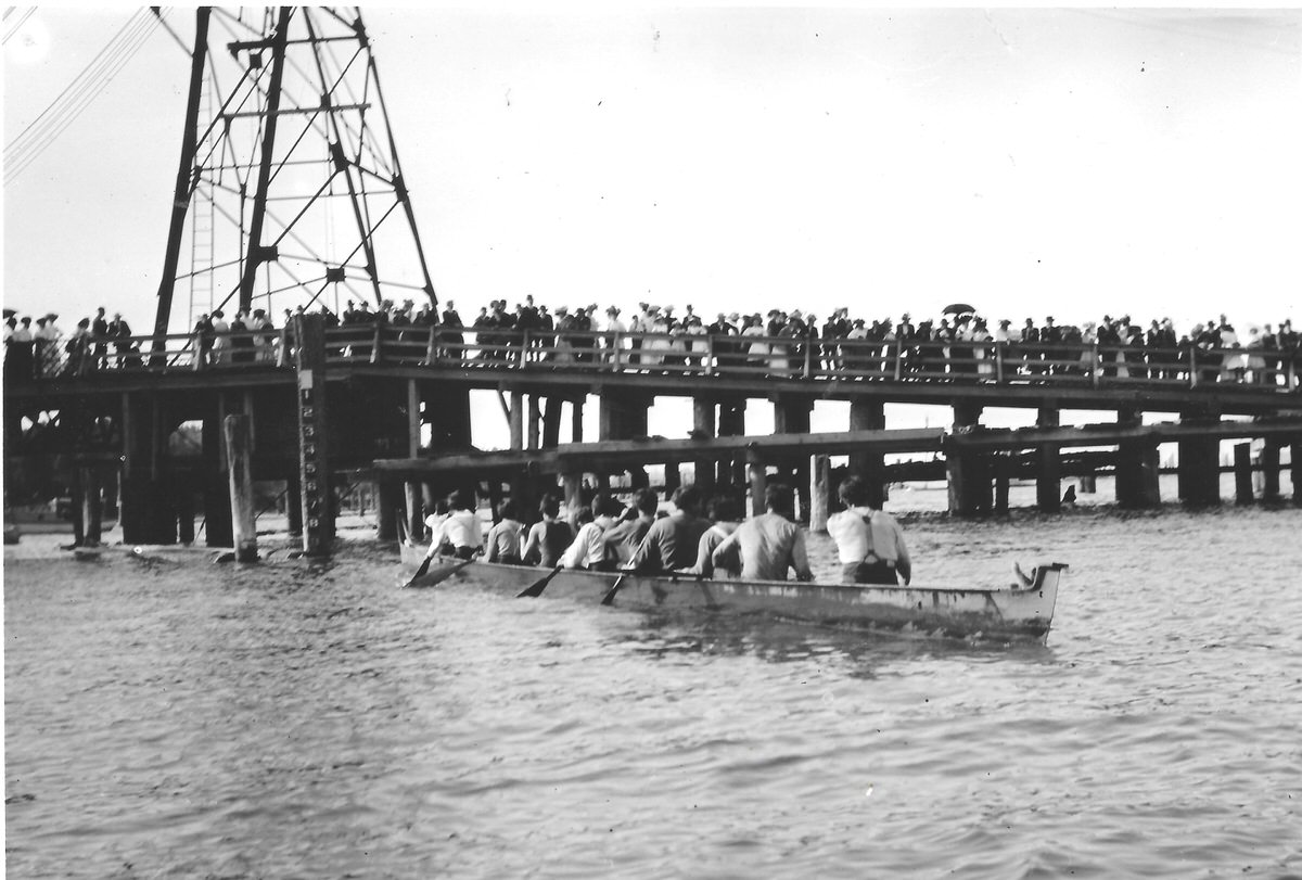 #55 Two long canoes racing in the Deschutes Estuary, Olympia, 1905