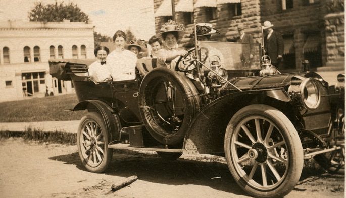 #78 Young women of legislative session in Governor Hay’s automobile, Olympia, 1909