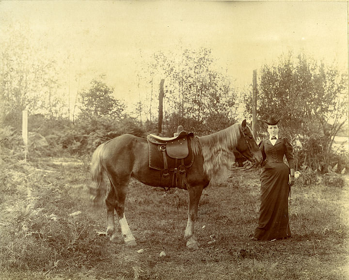 #51 Woman and horse, Tacoma, 1900