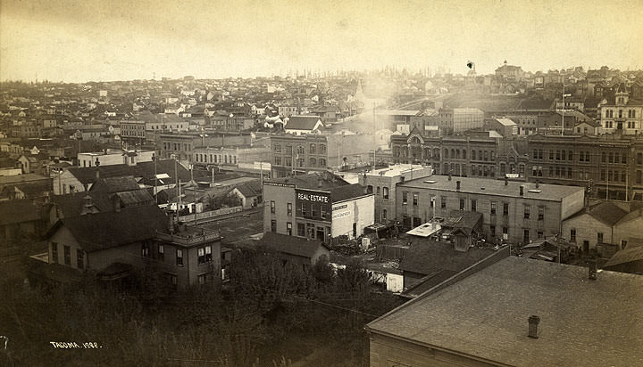 #48 Mostly commercial buildings are in the foreground and center of the image, Tacoma, 1888