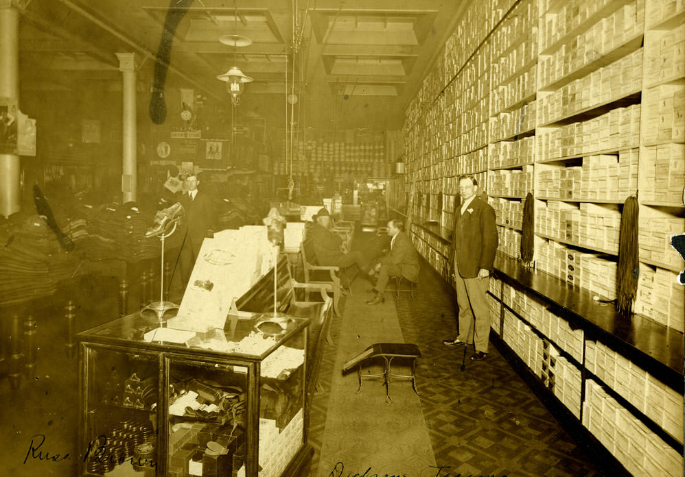 #154 Russ Brown and salesmen at Dickson’s Brothers shoe department, 1909