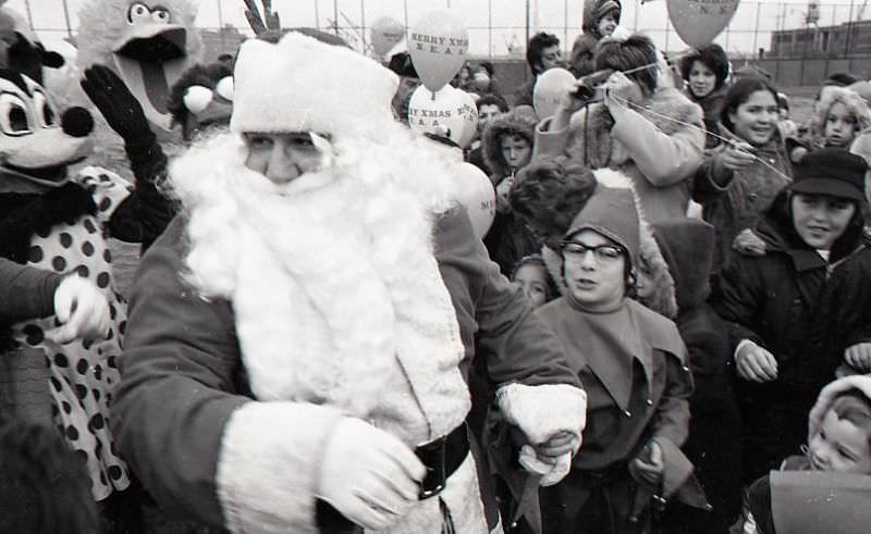 #5 Santa Claus with the crowd and other costumed individuals at North End Christmas Party and Parade