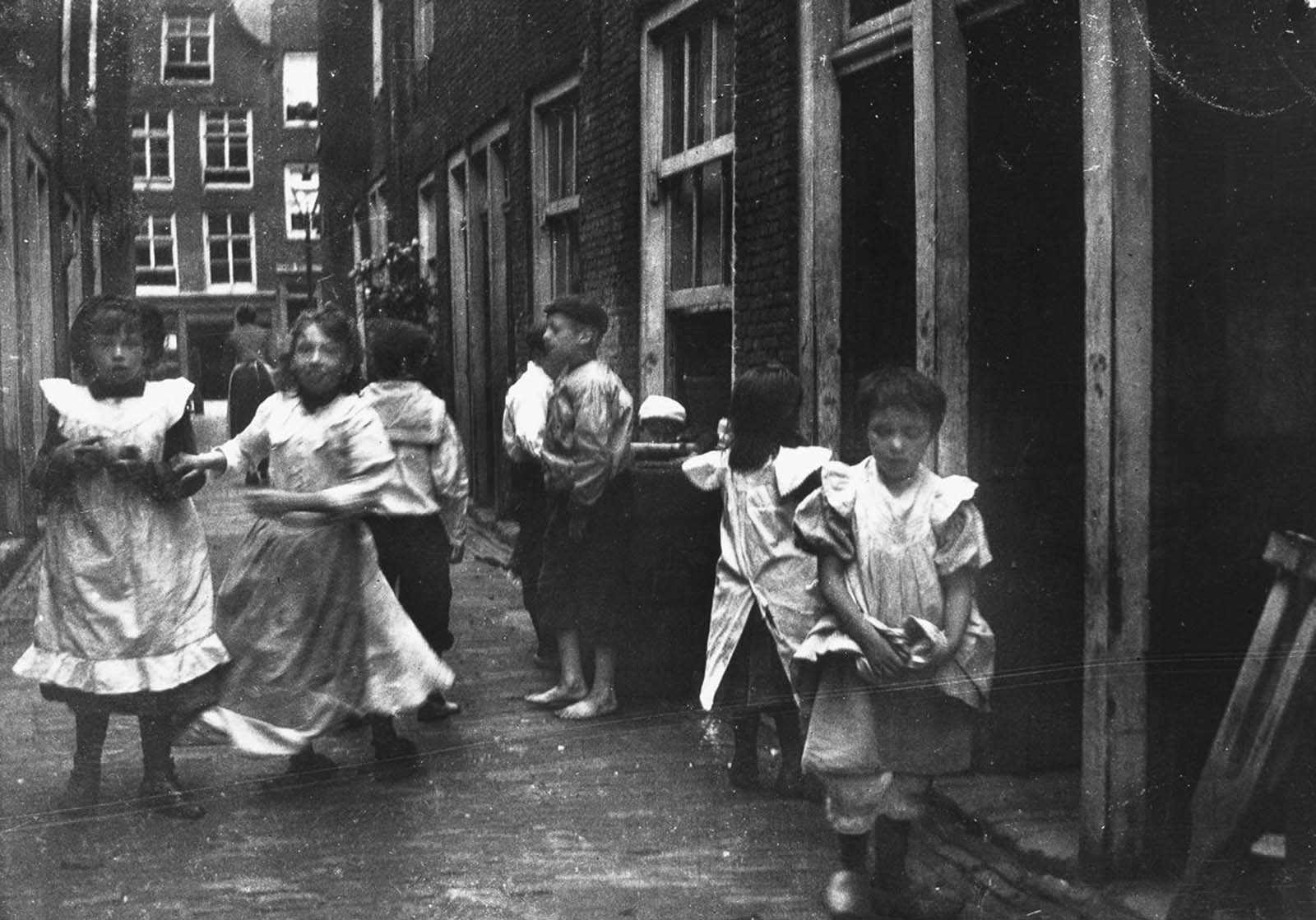 #4 Children play in an alley.