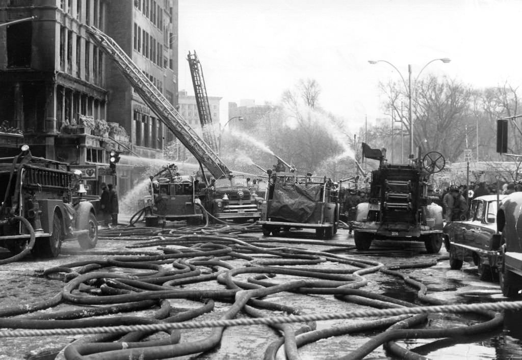 #175 Firefighters work to extinguish a general alarm fire on Tremont Street in Boston, Feb. 18, 1967.