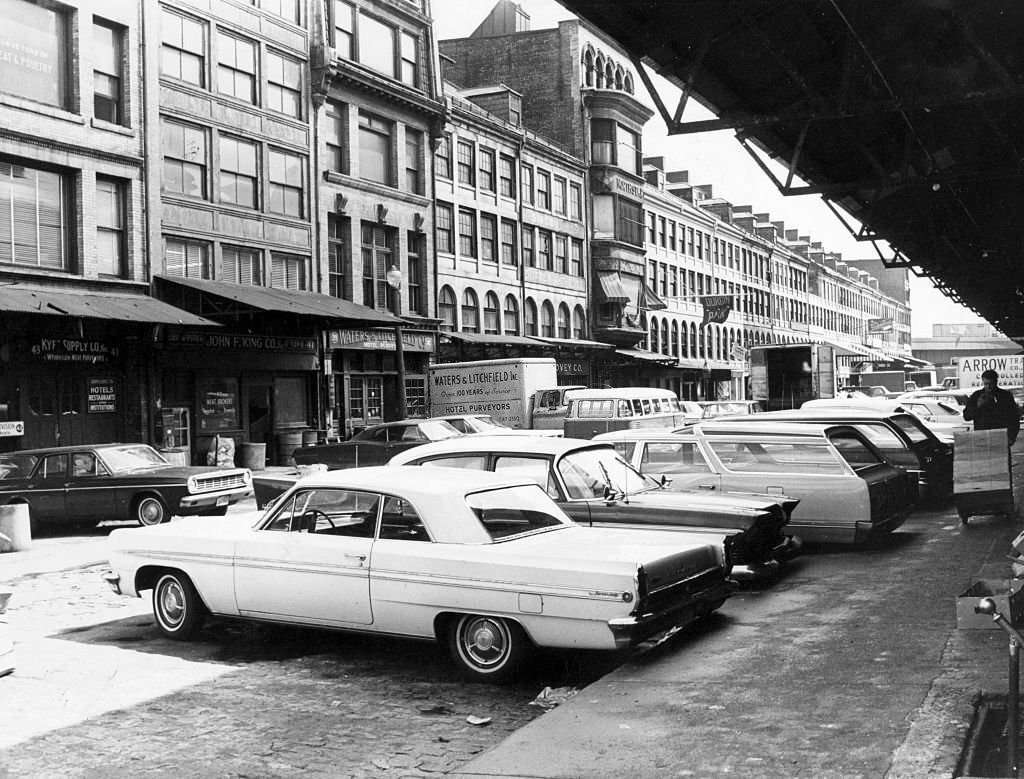 #181 Cars are parked along the sidewalk on North Market Street in Boston on May 3, 1967.