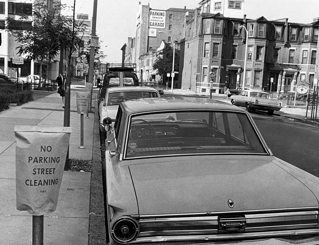 #227 Cars block Newbury Street in Boston’s Back Bay from being cleaned on Oct. 3, 1968.