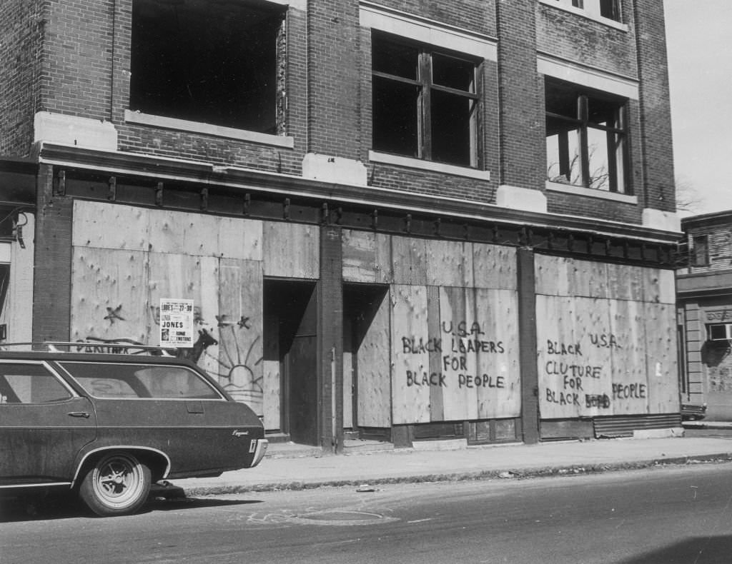 #286 Graffiti reading U.S.A.: Black leaders for Black people, Black culture for Black people, on boarded up buildings along Blue Hill Avenue in Boston on May 4, 1969.