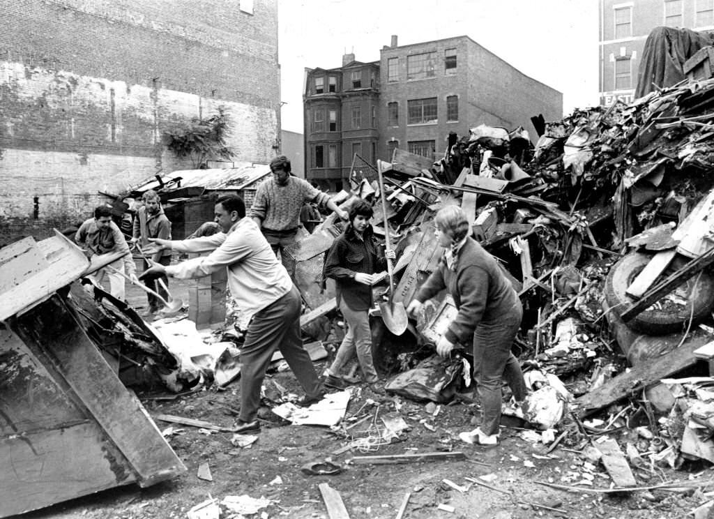 #262 A group of volunteers from local community youth agencies work to clean up a vacant lot at 114 West Brookline St. in Boston’s South End on Oct. 11, 1969.