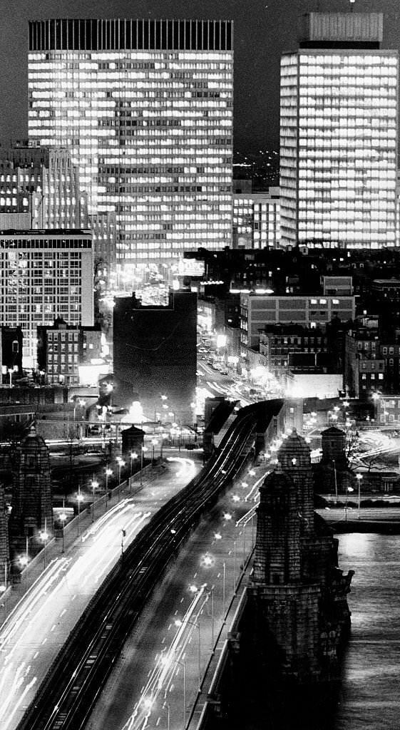 #269 Government Center in Boston is seen in an unusual view from the Cambridge side of the Charles River near the Longfellow Bridge at night on Dec. 5, 1969.