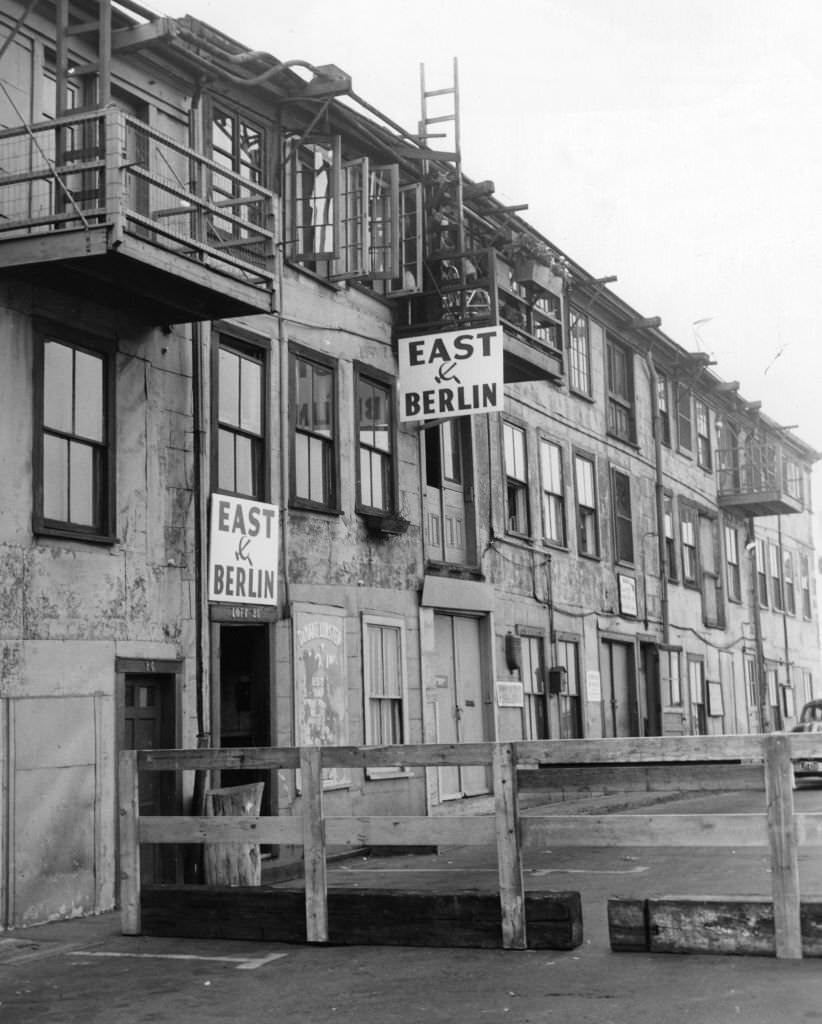 #38 Signs hang on buildings in the T Wharf in Boston, Sept. 1, 1961.