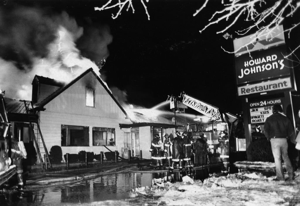 #52 Firefighters battle a three-alarm fire at the Howard Johnson’s hotel on Morrissey Boulevard in Boston, Jan. 25, 1961.