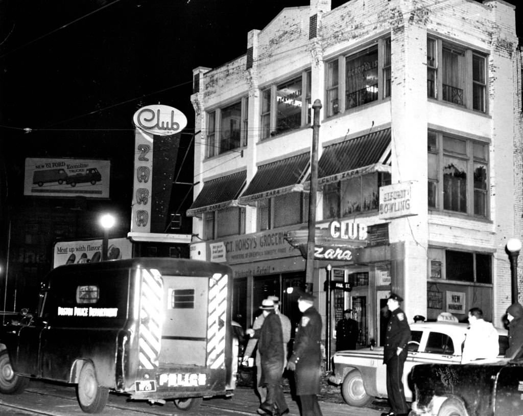 #7 The scene outside of a gambling raid at Club Zara on Tremont Street in Boston, 1961.