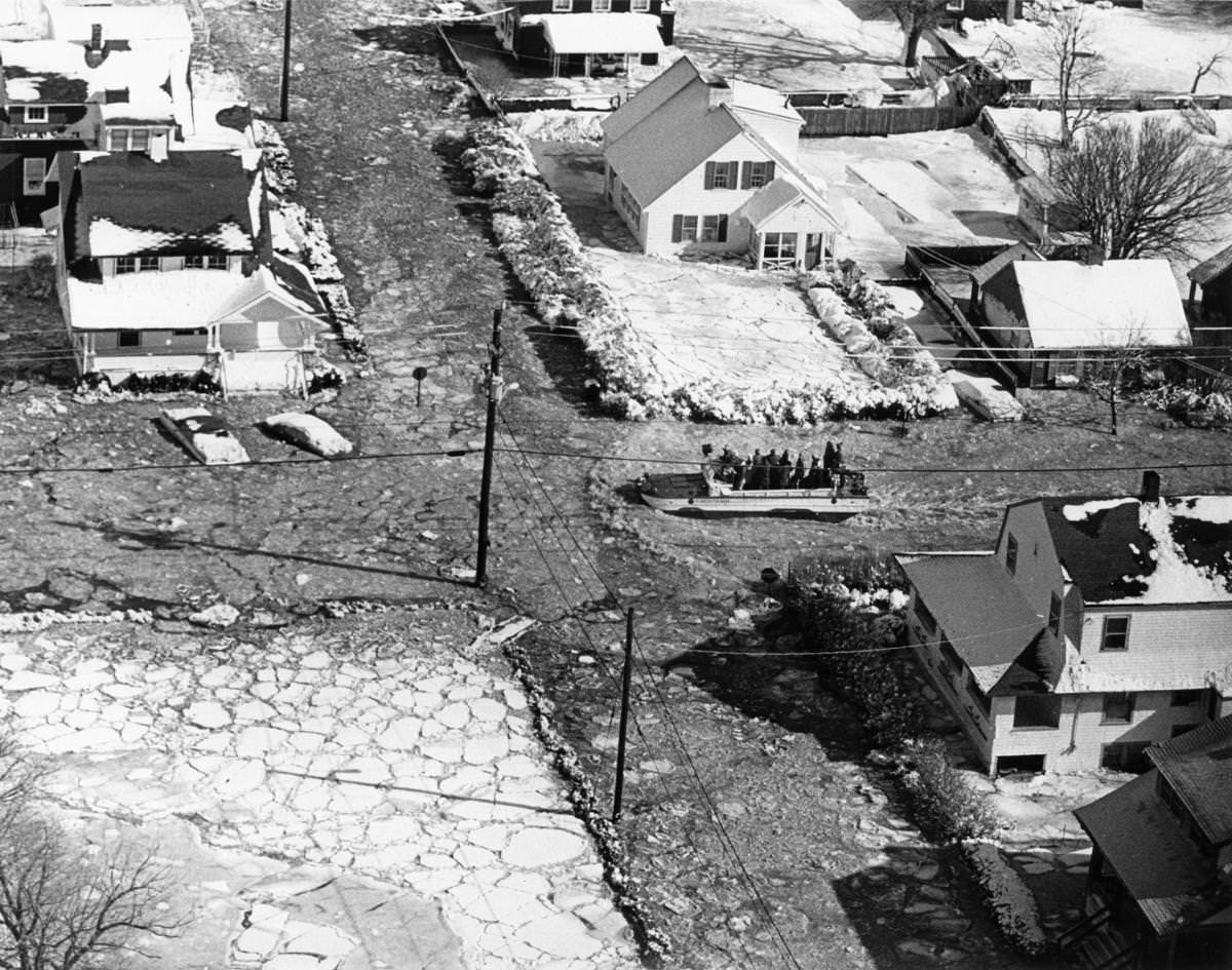 #6 A rescue vehicle moved through the flooded streets in Hull on Feb. 9.