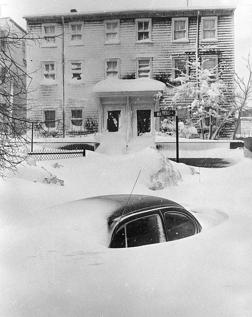 #53 A snow drift on Preble Street near Ward Street in South Boston covers a car up to its windows at 10 a.m. on Feb. 7, 1978.