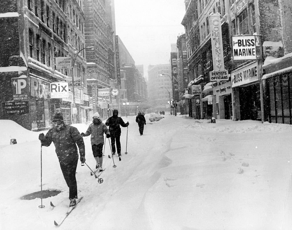 #58 It’s a wintry scene on Summer Street, as people use cross-country skis to get around Boston on Feb. 7, 1978.