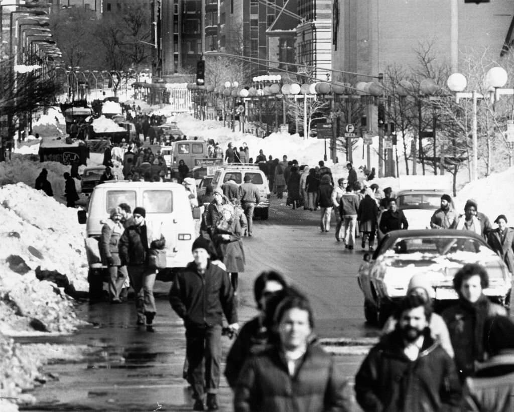 #80 People walk down Boylston Street in Back Bay on Feb. 11, 1978, following the Blizzard of 78.