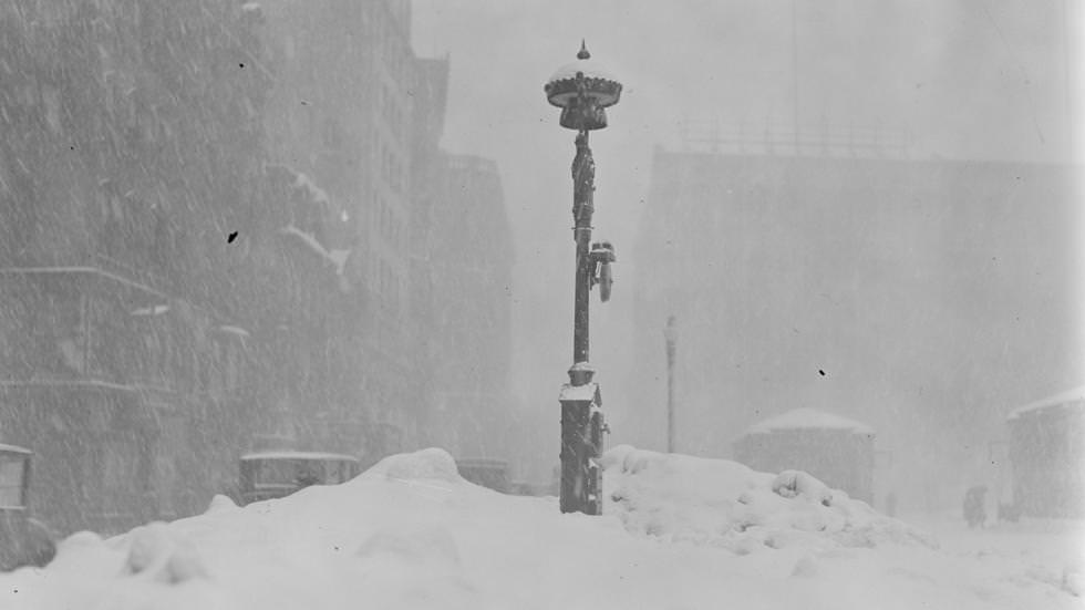 #13 Fire alarm box almost covered up by snow after severe snowstorm, 1923