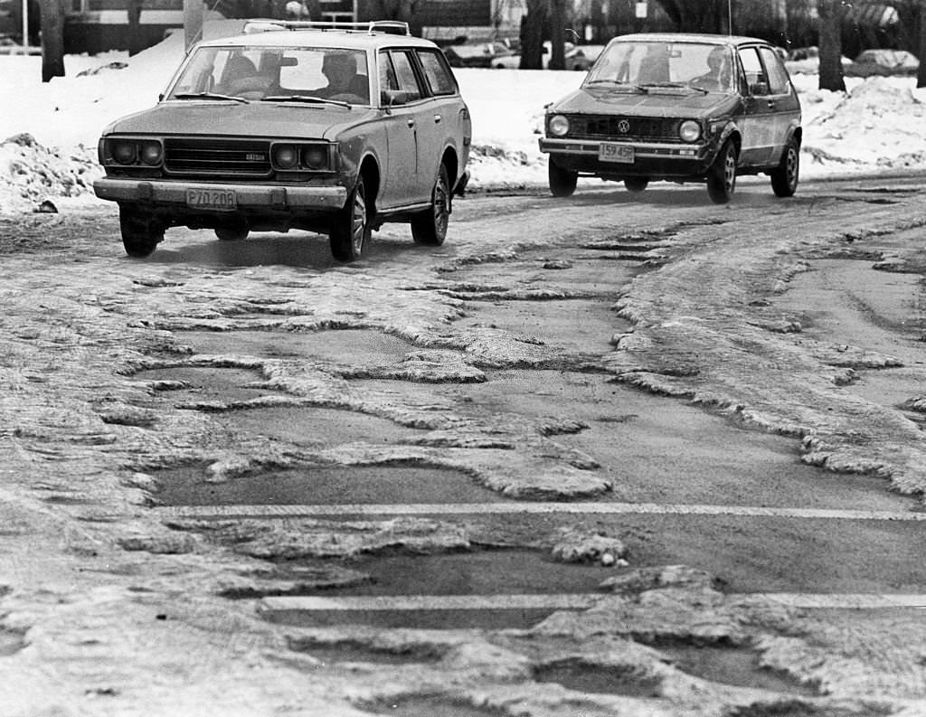 Cars encounter snowy, icy conditions on the roads near the Museum of Fine Arts in Boston’s Fenway neighborhood on Jan. 12, 1977.