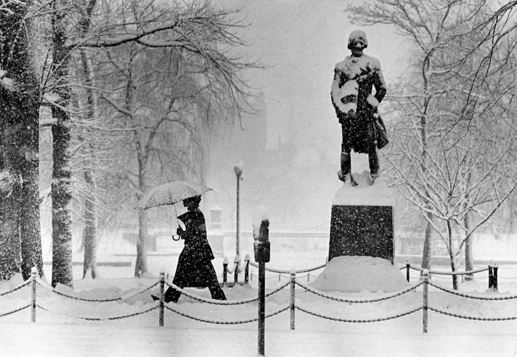 #136 The snowy scene on Boylston Street at Boston’s Public Garden during a winter storm, 1975.