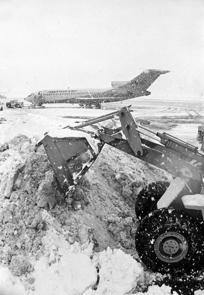 #159 Clearing snow after blizzard at Local Airport, East Boston, Massachusetts, 1970.