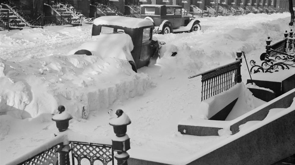 #25 Snow-covered automobiles on Boston streets, 1934