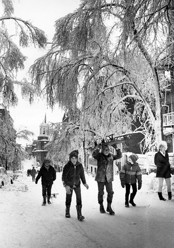 #33 Children carry sleds down the streets of Beacon Hill neighborhood in Boston.