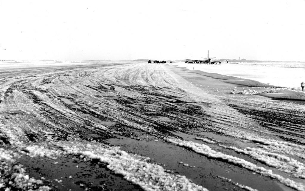 #55 A snowy runway that a jetliner veered off of at Logan Airport in Boston, 1960.