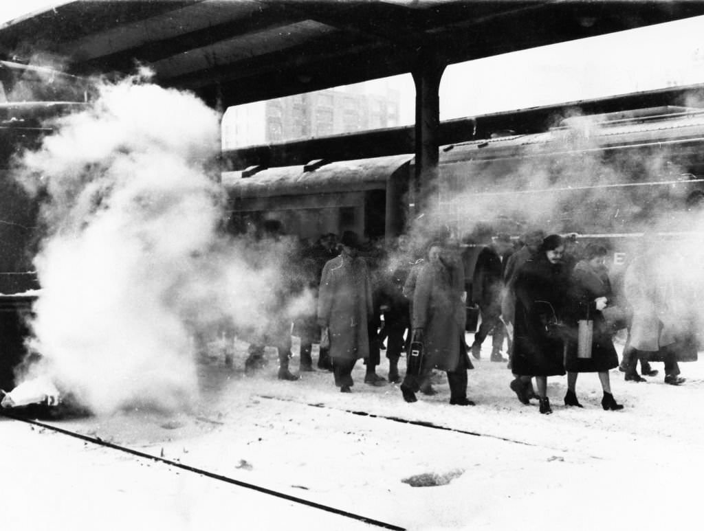 #58 People on a train from Needham arrive at South Station in Boston, 1960.