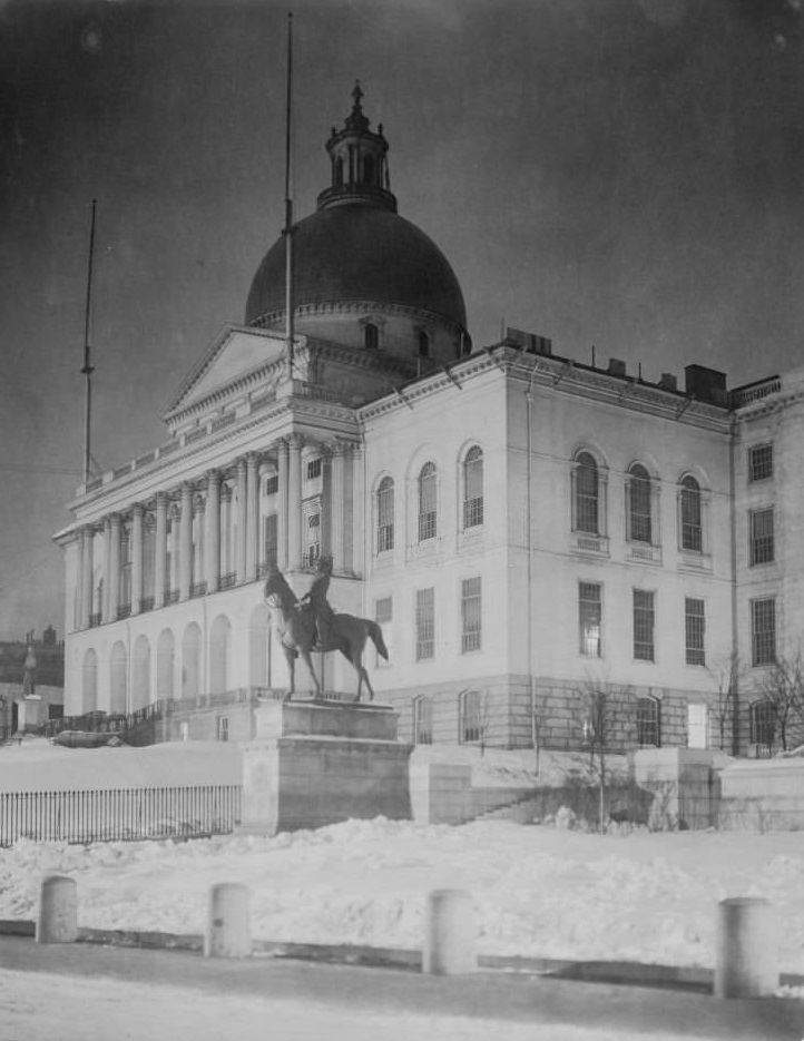 #94 Front right view of State House, equestrian statue in foreground, snow on ground, Boston, Massachusetts, 1906. (