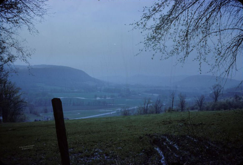 #17 Looking northward from Whaupaunaucau across the Chenango Valley. Steam Sawmill Hill is at left, circa 1962