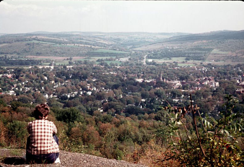 #41 Mom at the West HIll quarry, looking down on Norwich, September 1965