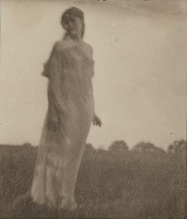 #39 Woman in landscape, Maine, 1910