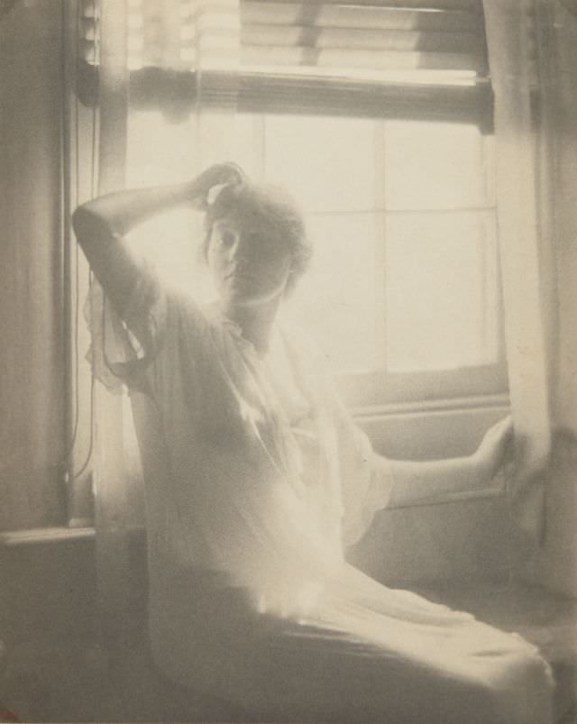 #41 Woman seated in front of window, circa 1910