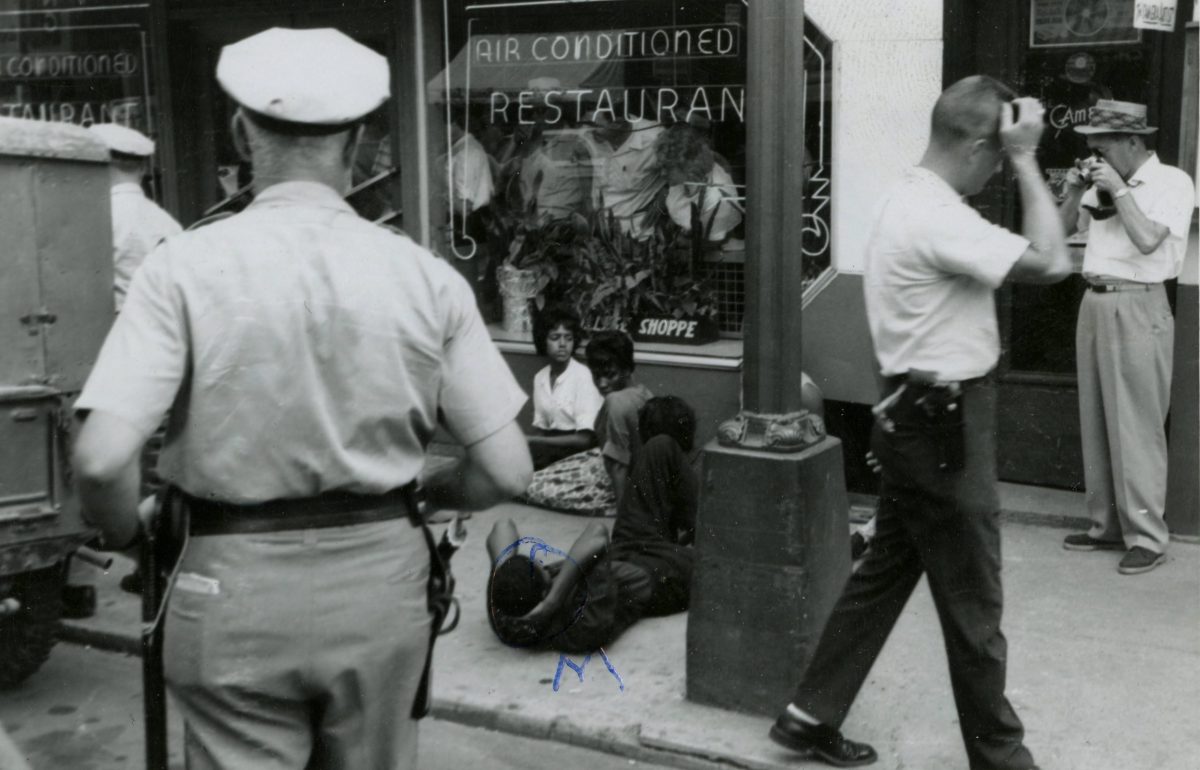 #3 On July 26, 1963, student protesters on Main Street in Farmville stage a sit-in outside the College Shoppe restaurant, which refused to serve black patrons.