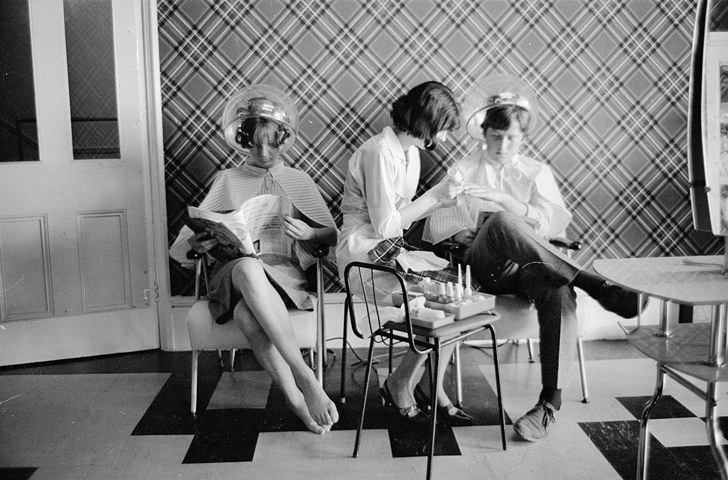 #12 Young people in the beauty parlour of the ‘Caribbean Hotel’ which caters especially for teenagers on holiday in Bognor Regis, Sussex, 1965