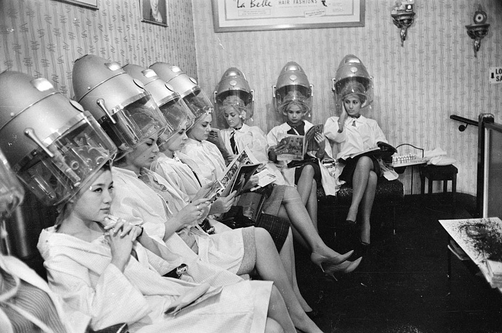 #20 Miss World Contestants visit a hairdresser before the big event, 1963