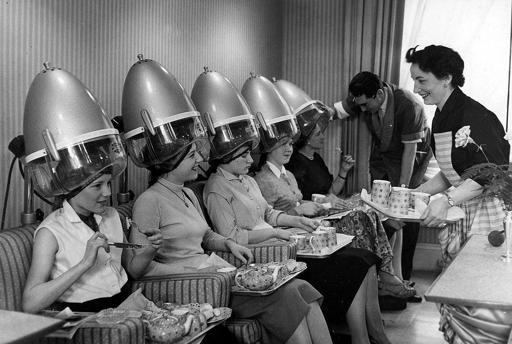 #44 Luncheon is served to ladies under the hairdryers at the hairdressers, 1957