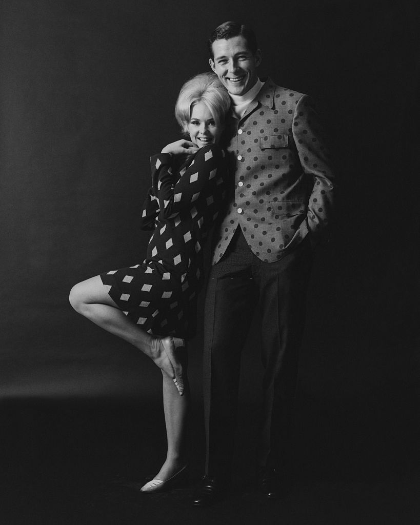 #35 Joey Heatherton posing with a male model