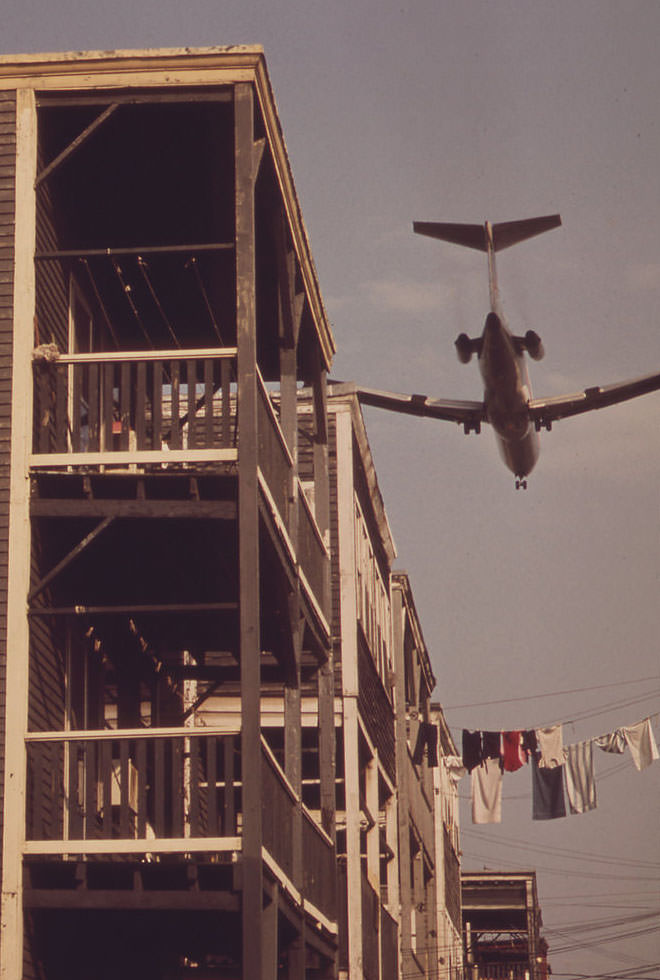 #3 Near Logan Airport – Airplane Coming in for a Landing Over Neptune Road Backyards, 1973