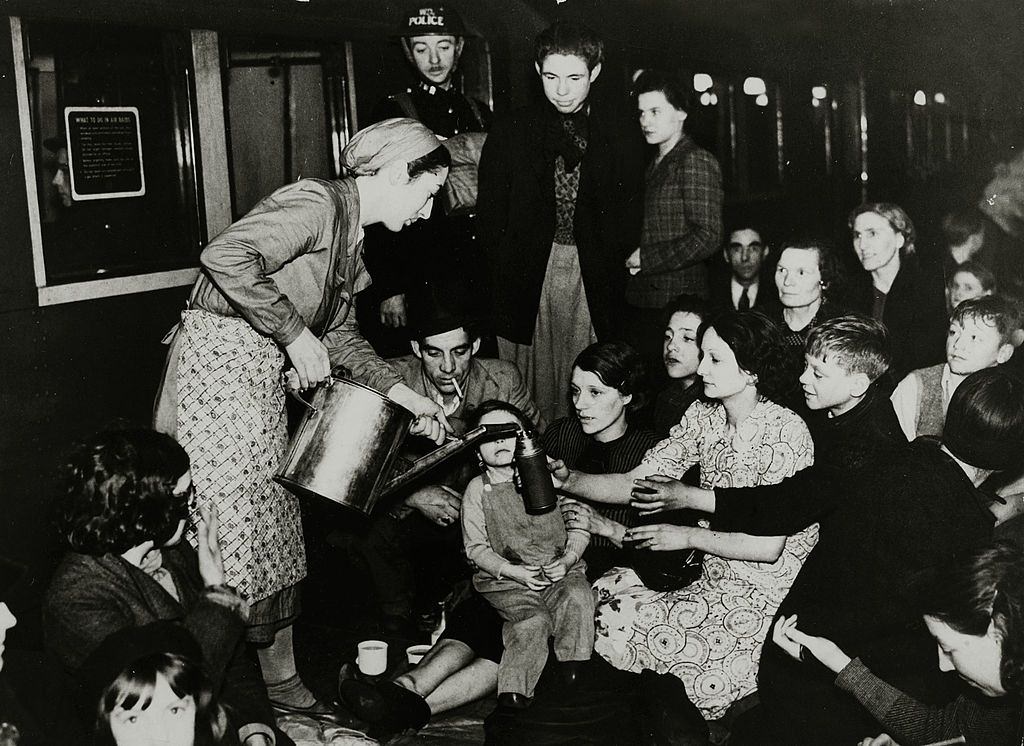 #7 An underground canteen at work serving tea to people sheltering at Holland Park Station.
