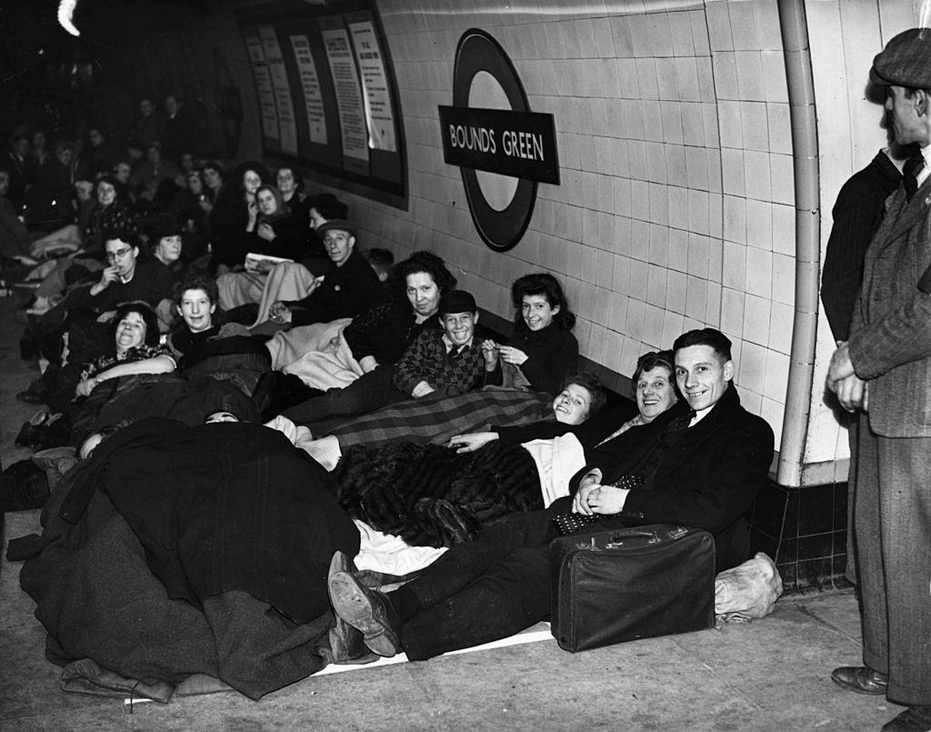 #9 Londoners sheltering on a platform at Bounds Green tube station during an air raid in The Blitz.