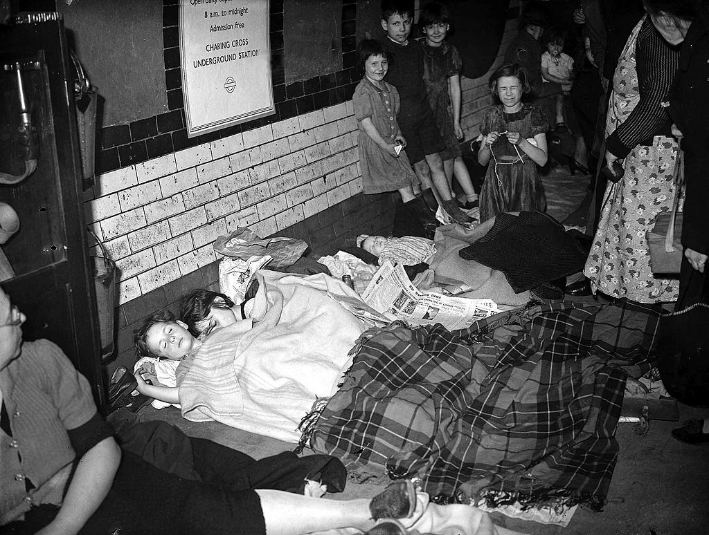 #53 Members of the public huddle together in a London underground station, 1940