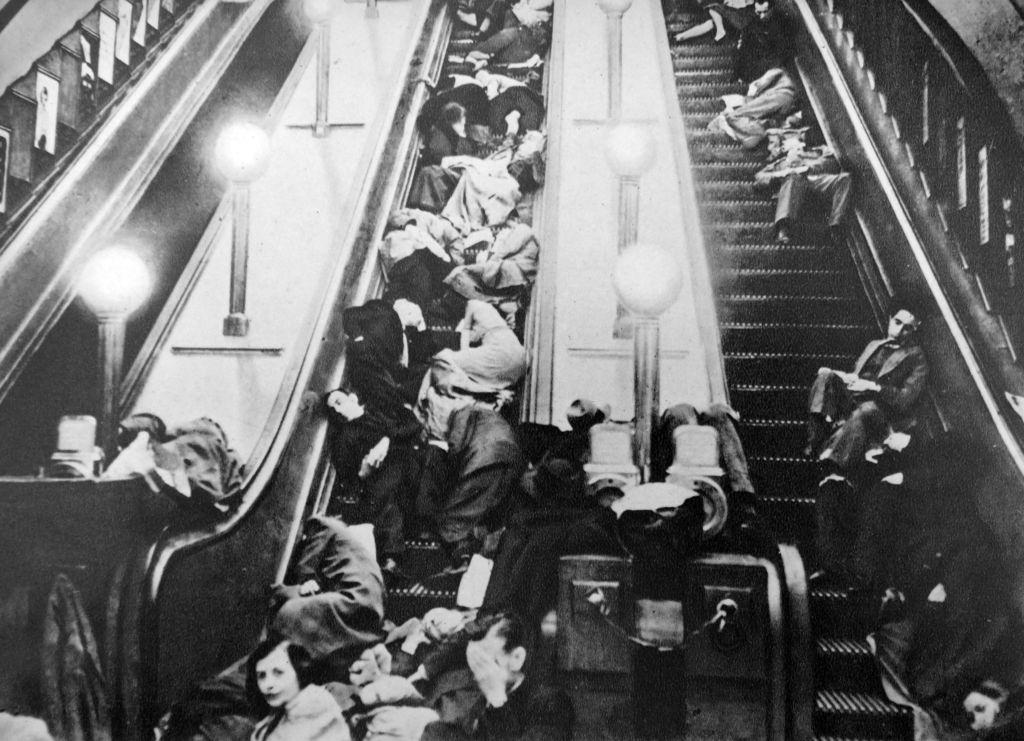 #20 London underground escalators packed with people sheltering from an air raid in world war two 1941.