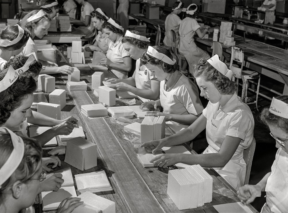 #13 Workers packing butter cut into squares for use in restaurants at Land O’Lakes plant, Minneapolis, Minnesota, July 1941