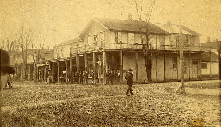 #15 Corner of Fourth Avenue and Main Street (now Capitol Way), Olympia, 1890s.