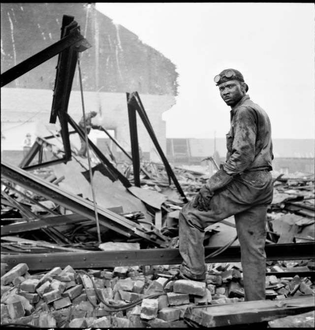 #1 Workman on wrecking project at the Point, 1950