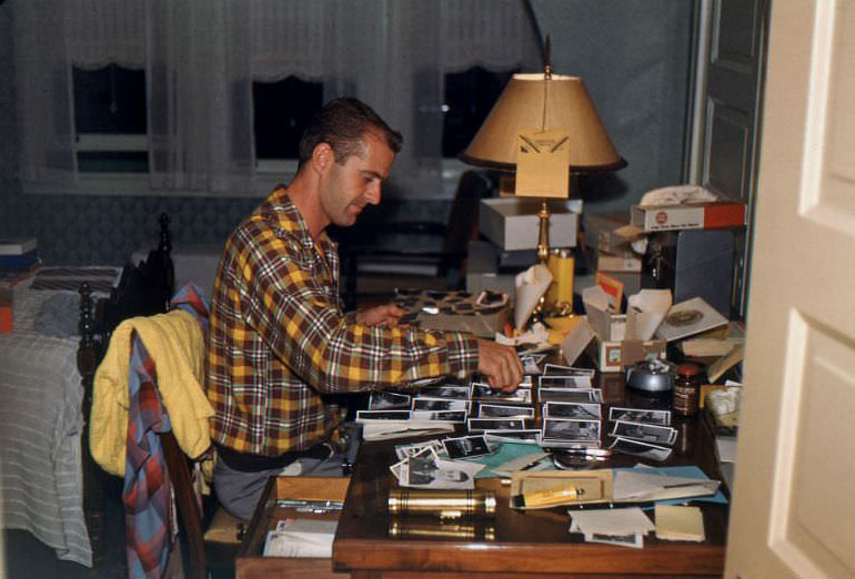 #5 Robert Kross (1920-2011) with his photo prints and negatives at Elmhurst, Illinois, 1952