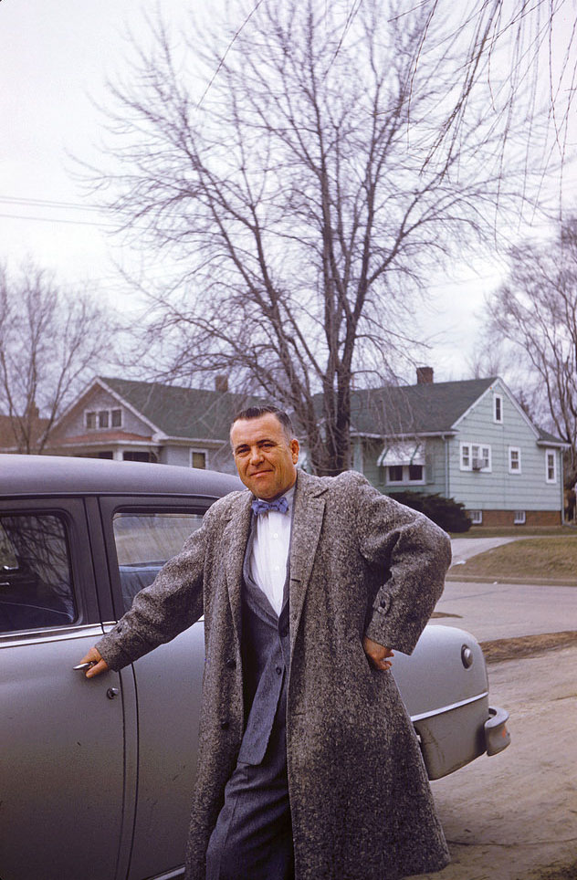 #47 Man poses with his car, Peoria, Illinois, 1957